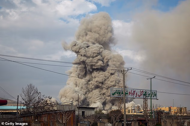 106823297 15616553 A Plume Of Smoke Rises After An Explosion In Tehran Yesterday A 163 1772711352425